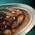 Plate of Sesame-Crusted Coq Au Vin.png