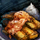 Bowl of Grilled Bananas with Passion Fruit Sauce.png