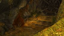 The vault door with the four consoles (and concealed entrance to Khan-Ur's Gauntlet).